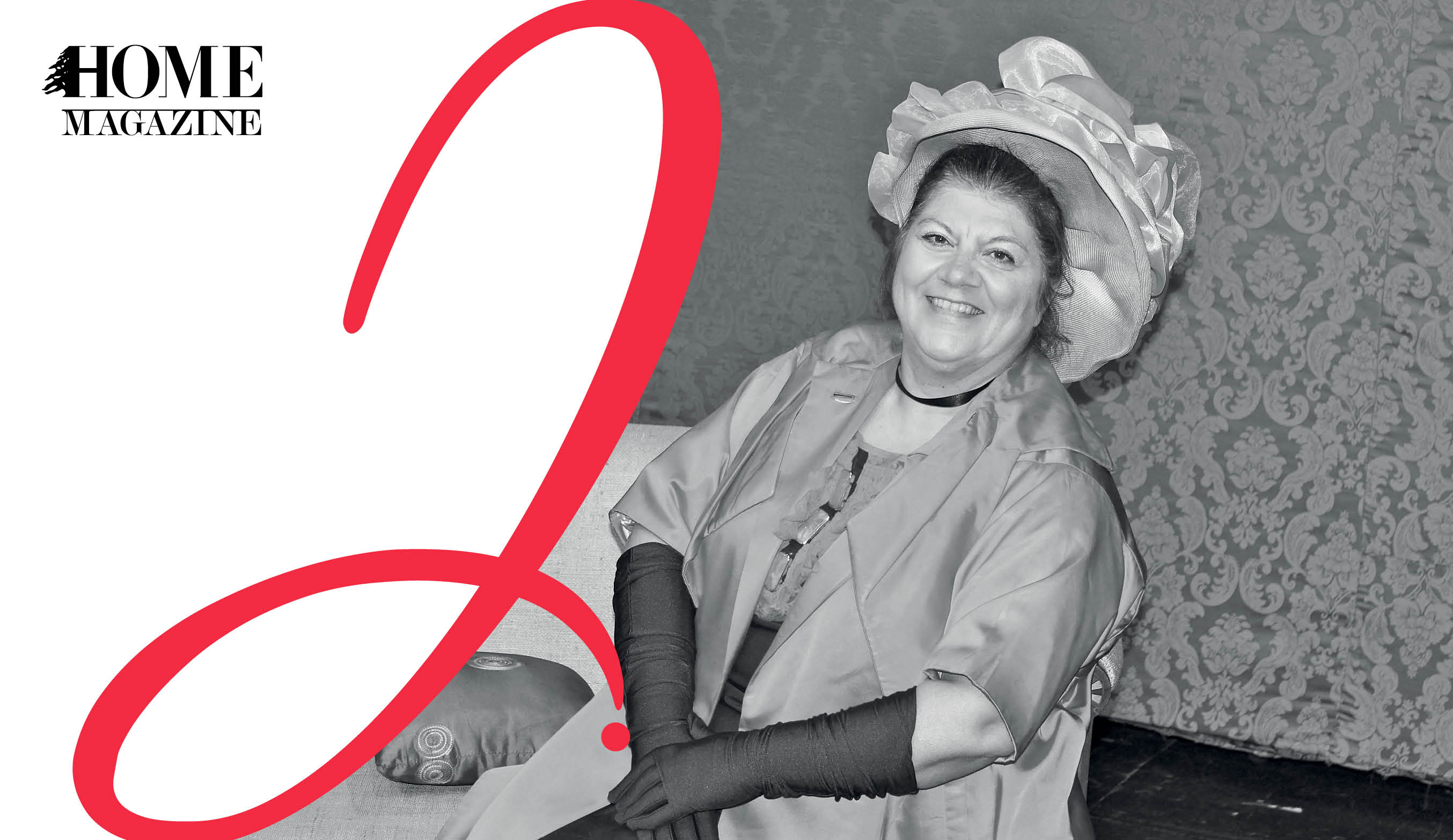 Smiling woman wearing costume with hat and letter J