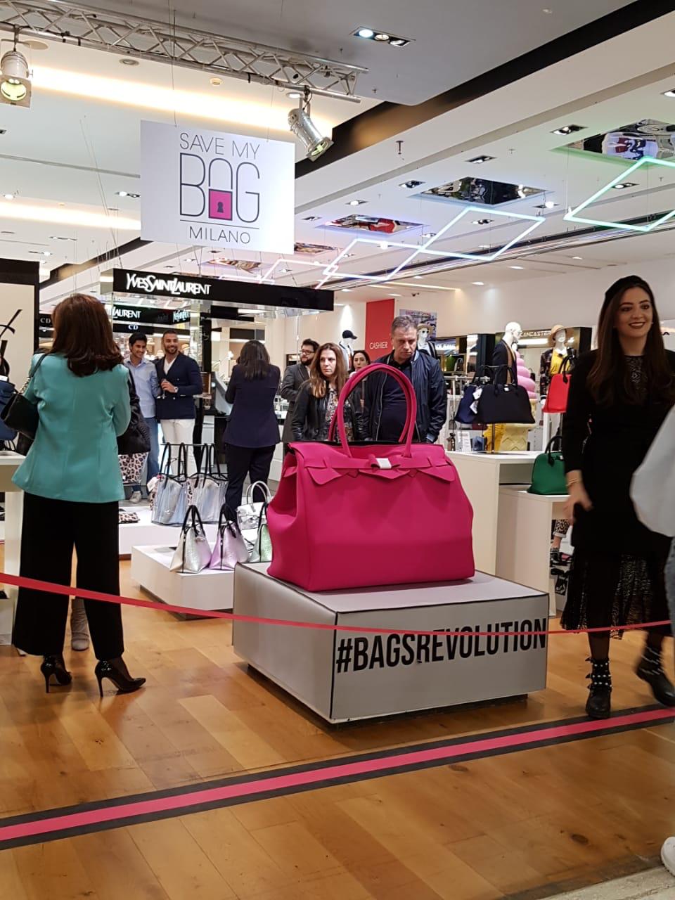 Bags stand with crowd