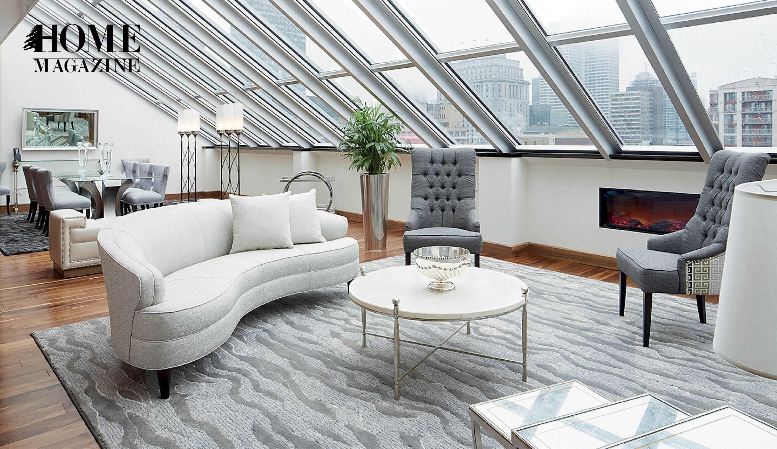 Living room with glass ceiling and grey and white couches
