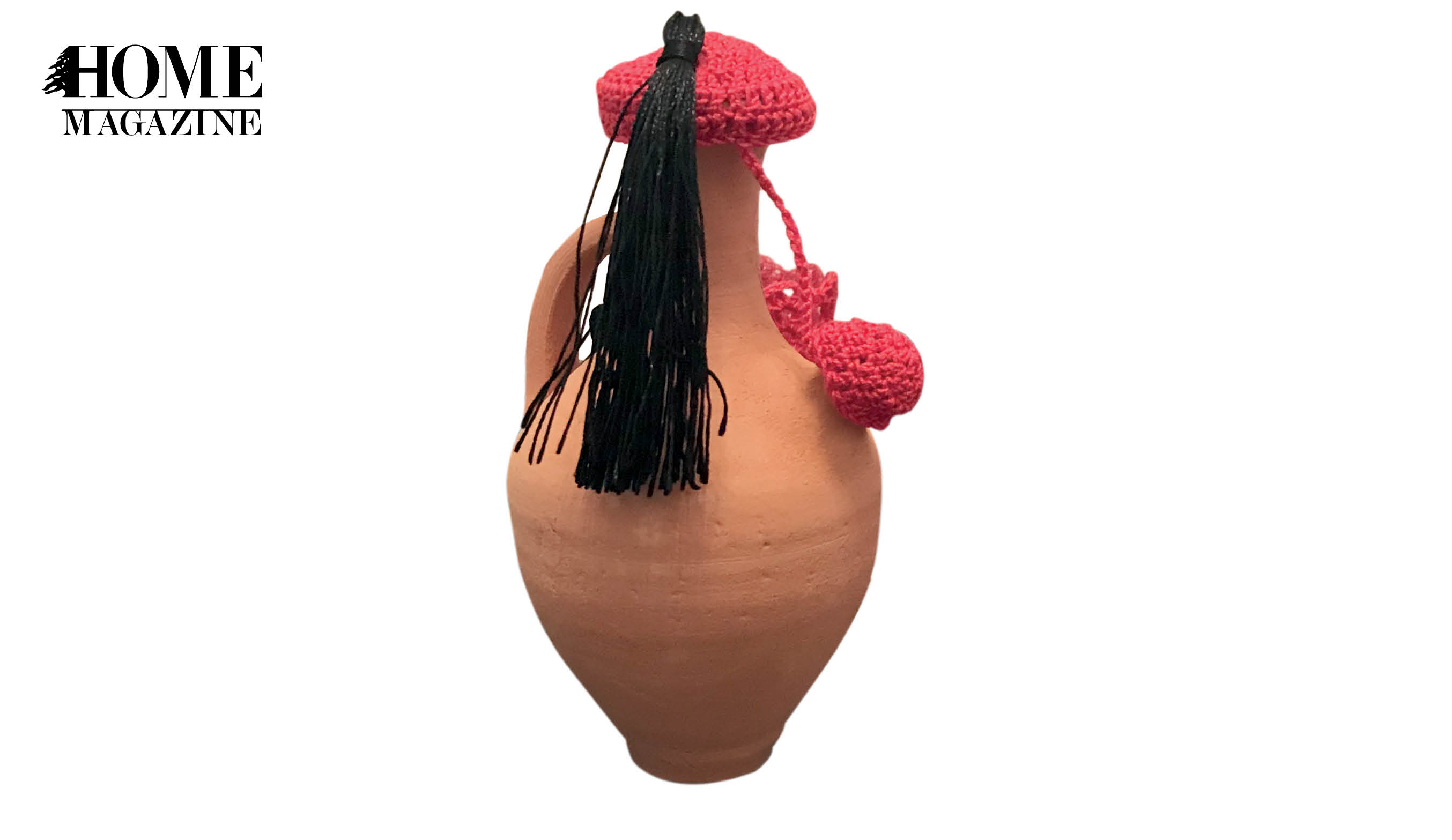 Clay pitcher with red crochet