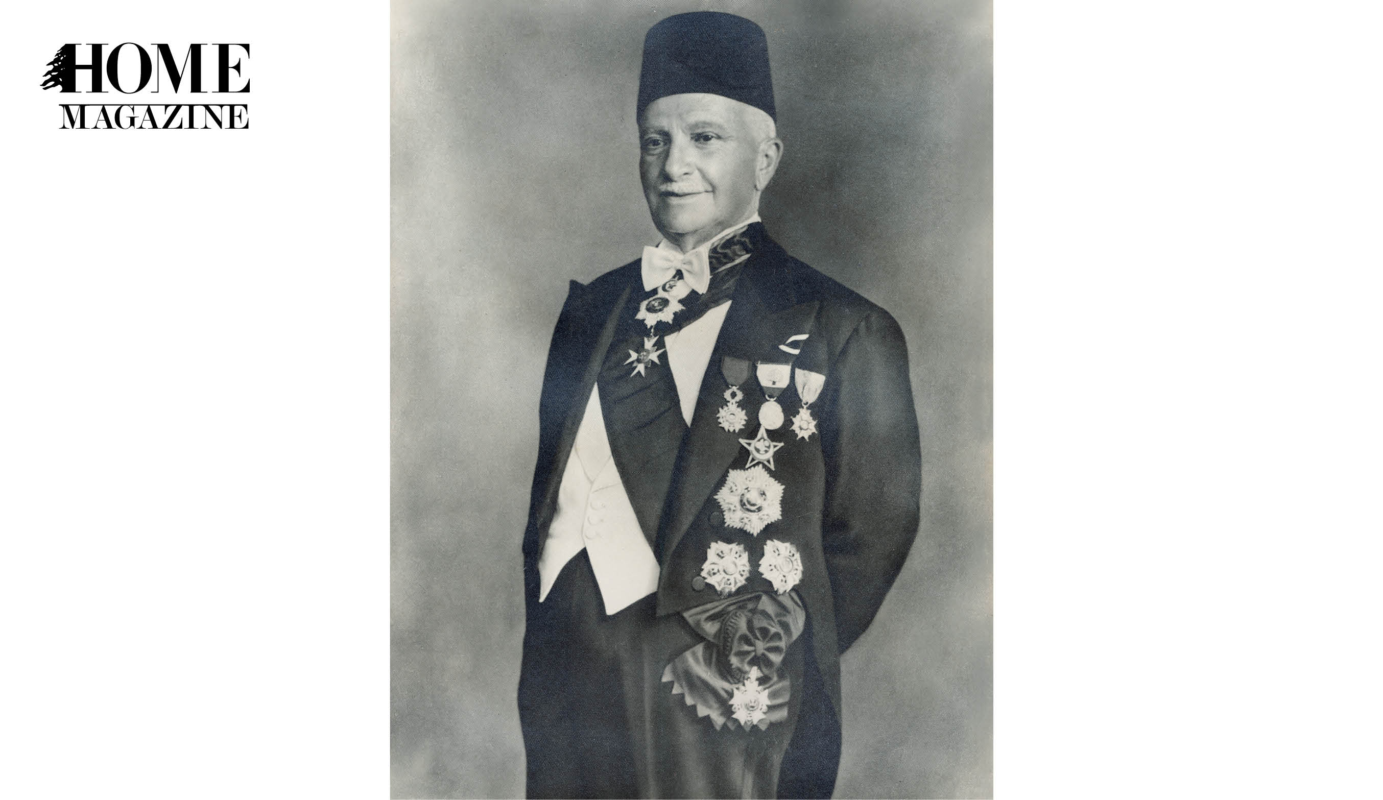 Black and white picture of an old man wearing suit and hat