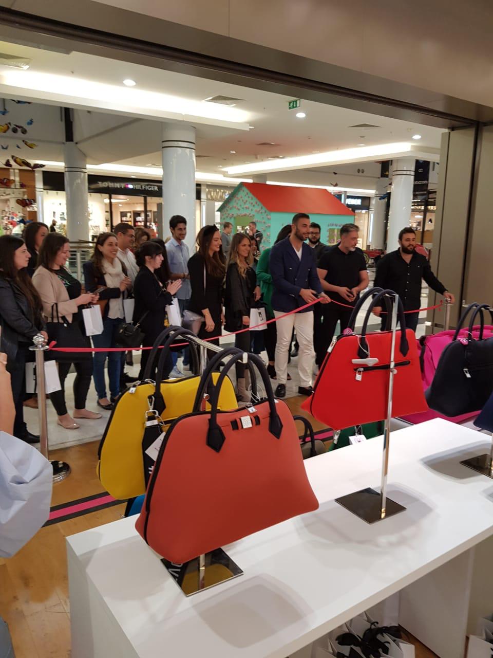 Bags stand with crowd