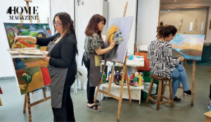 Three women painting