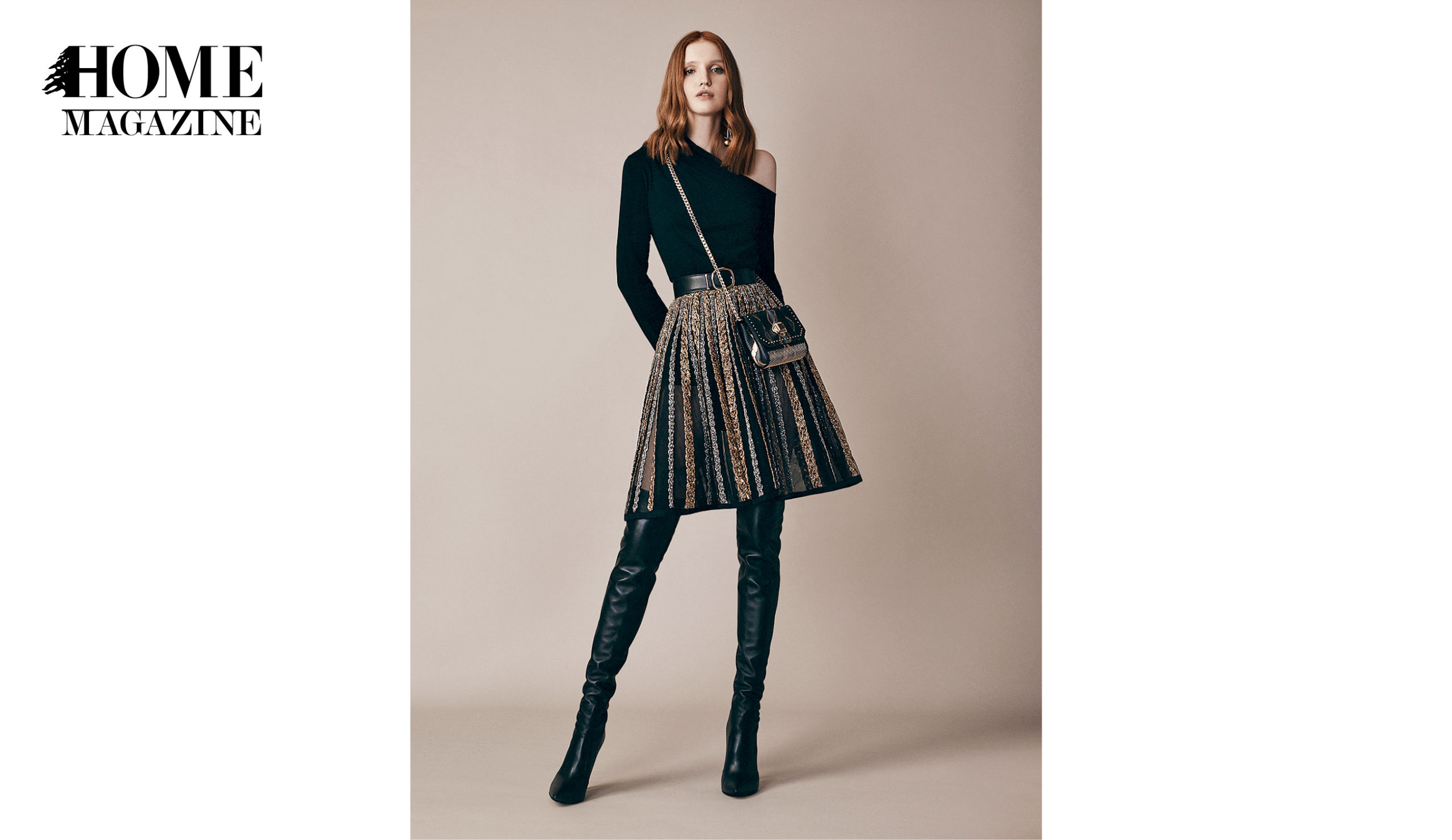 Model wearing black top and midi skirt