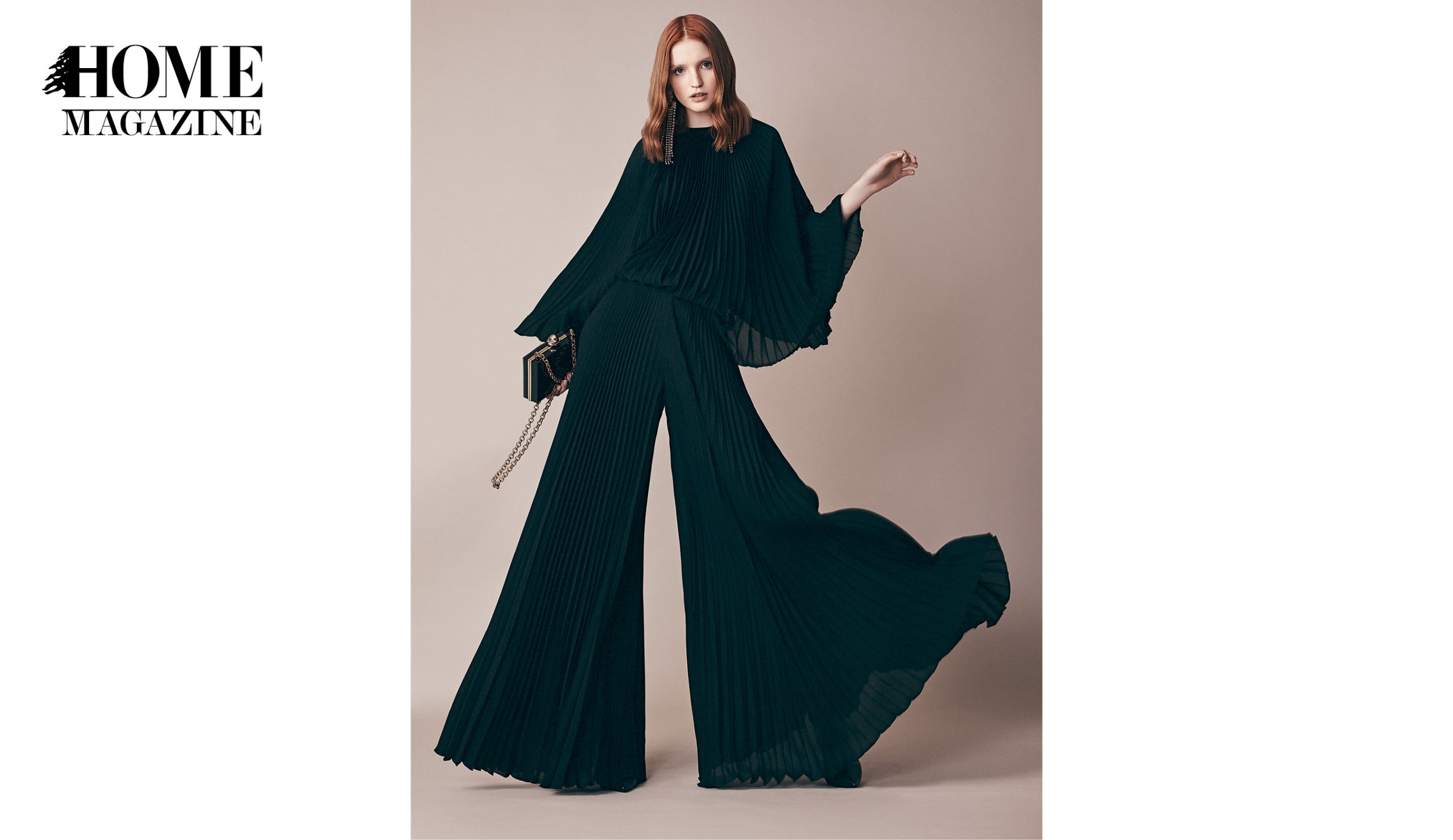 Model wearing black attire with flared trousers