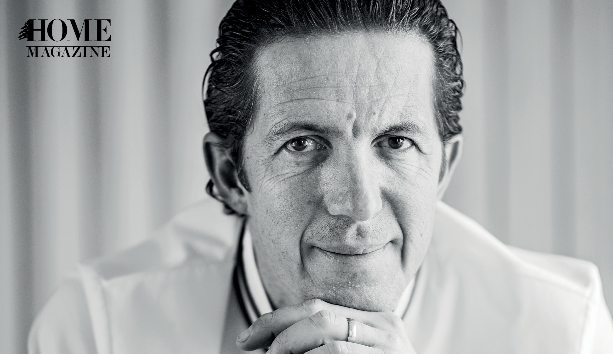 Black and white face portrait of a man with black hair